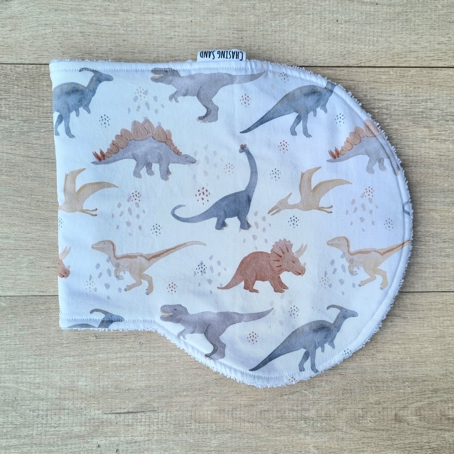 Burp Cloth - Dino against wooden backdrop. Watercolour dinosaur illustrations white background.