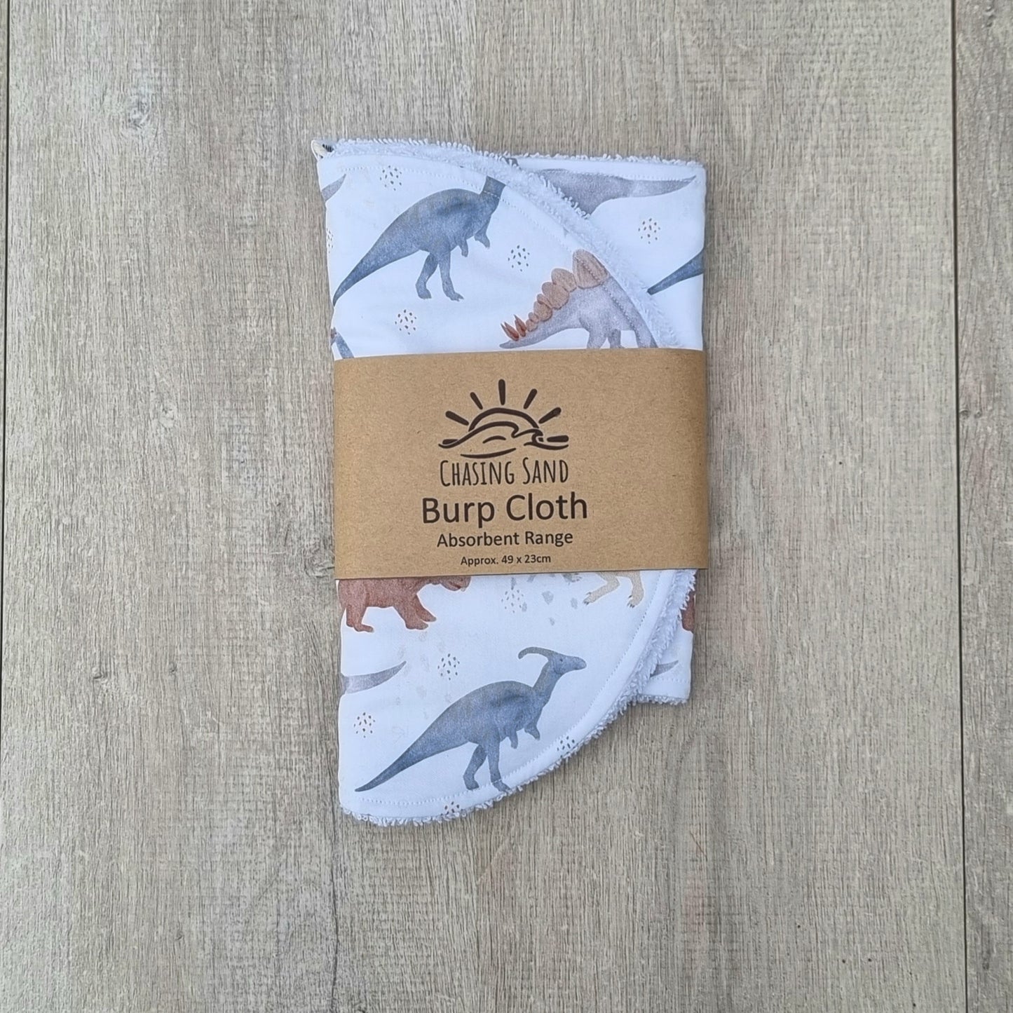 Burp Cloth - Dino against wooden backdrop. Watercolour dinosaur illustrations white background.