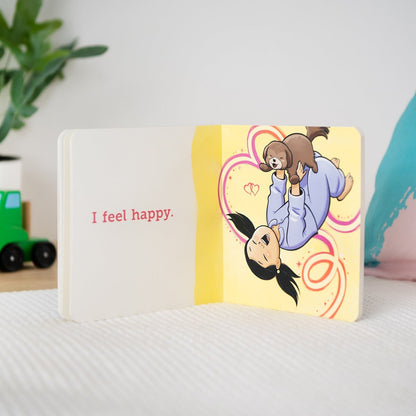 Page titled I feel happy with toddler playing with dog.
