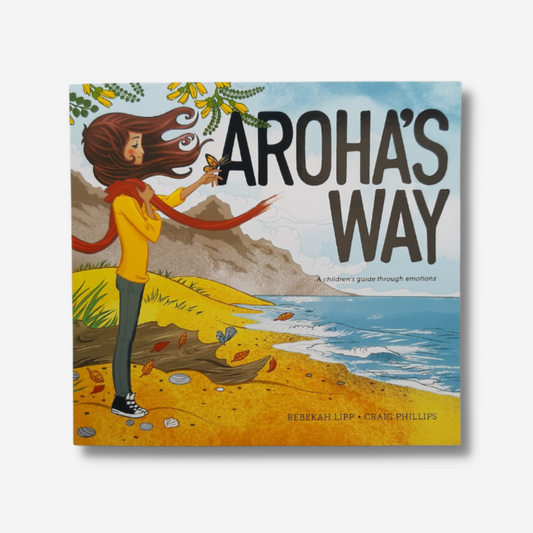 Aroha's Way book. Cover: Brown-haired girl standing on a beach, wearing yellow shirt and red scarf, looking at a butterfly on her finger. 